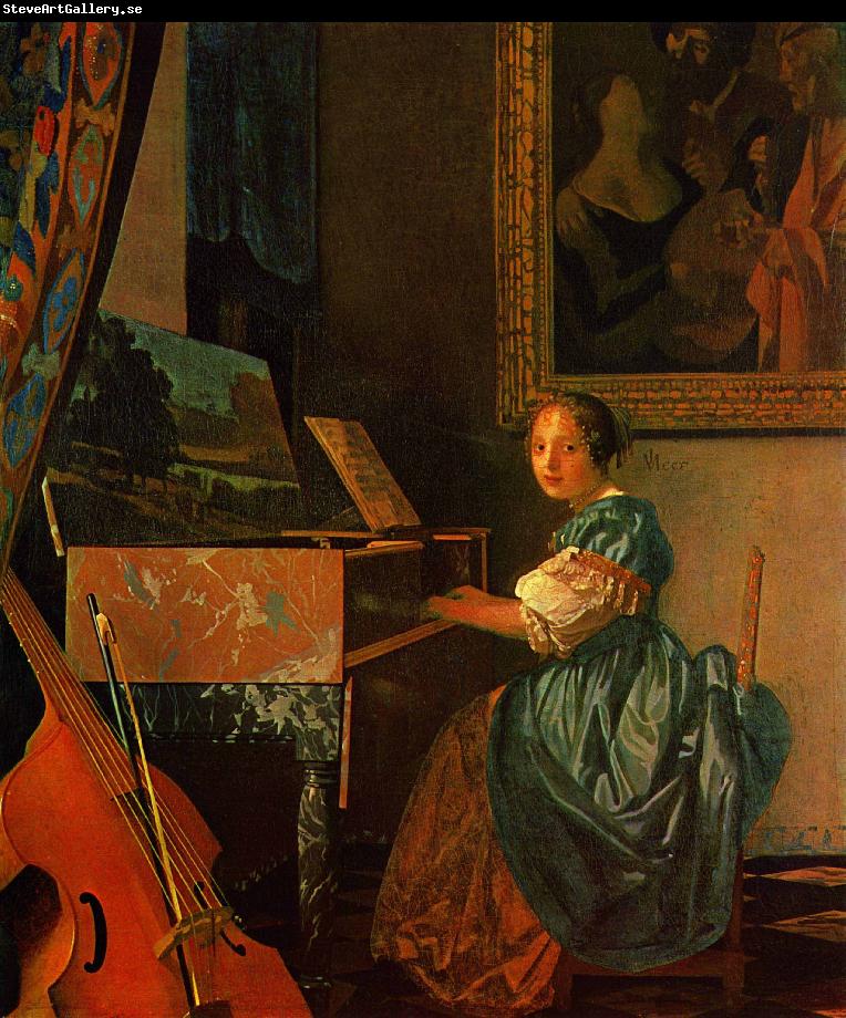 Johannes Vermeer A Lady Seated at a Virginal